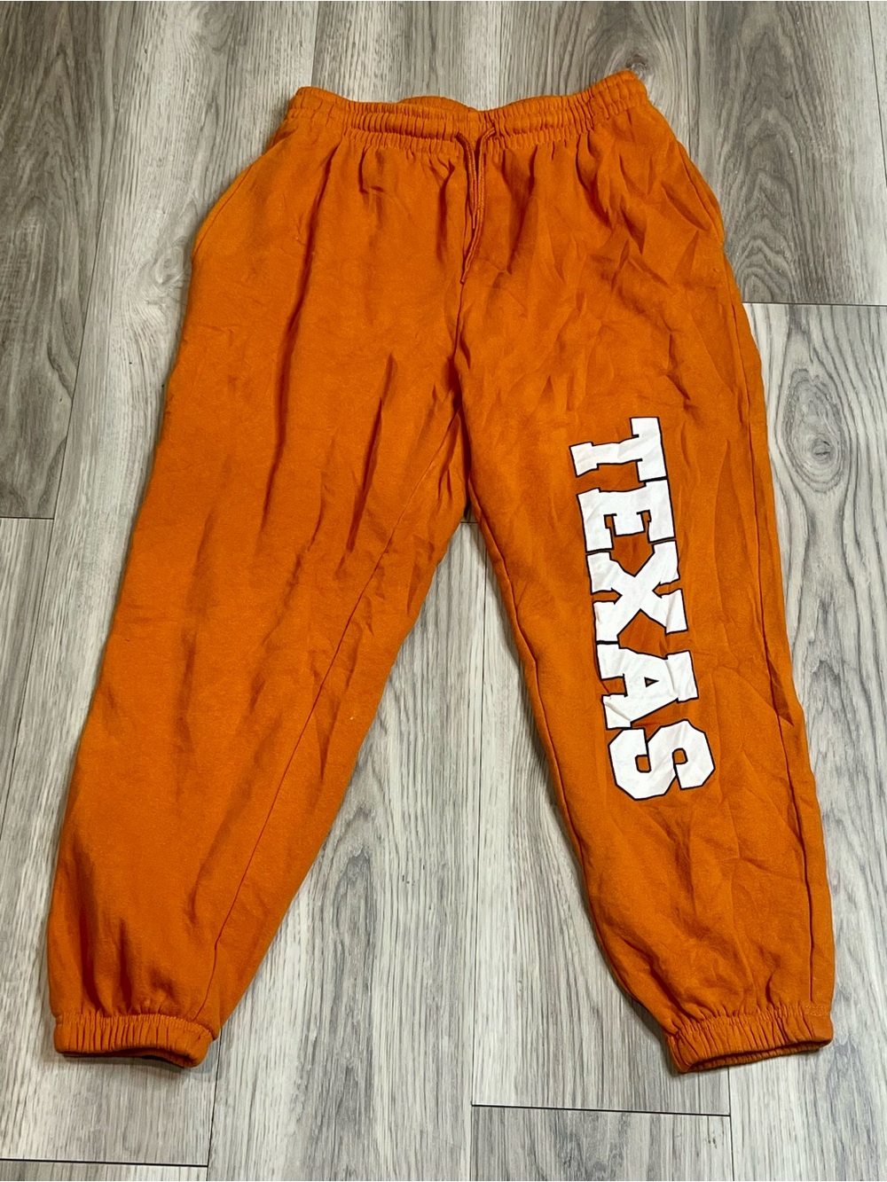 TEXAS logo burnt orange joggers